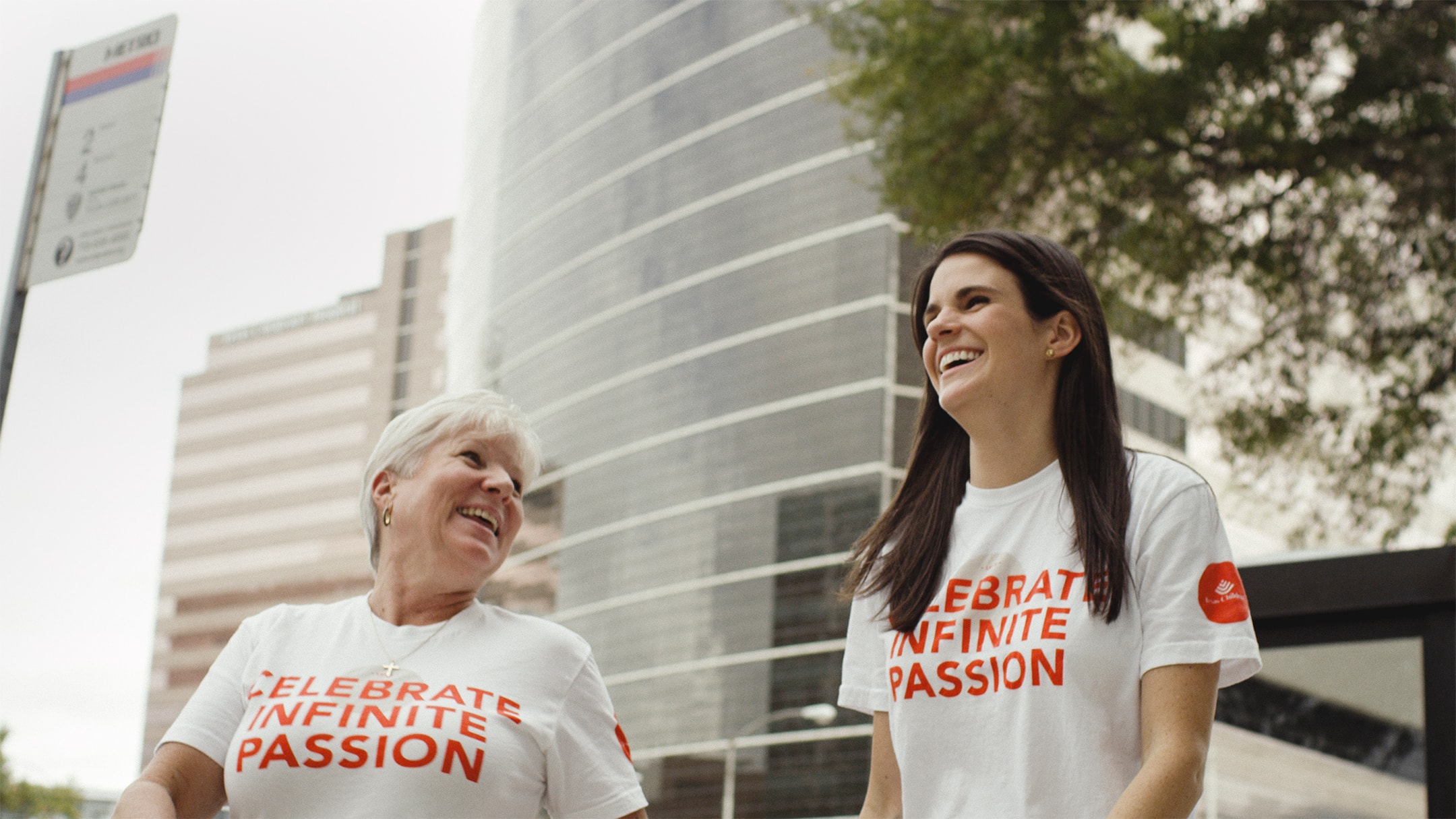 Two Texas Children's Hospital employees smiling in a culture tshirt. Part of an internal hospital branding effort for Texas Children's hospital.