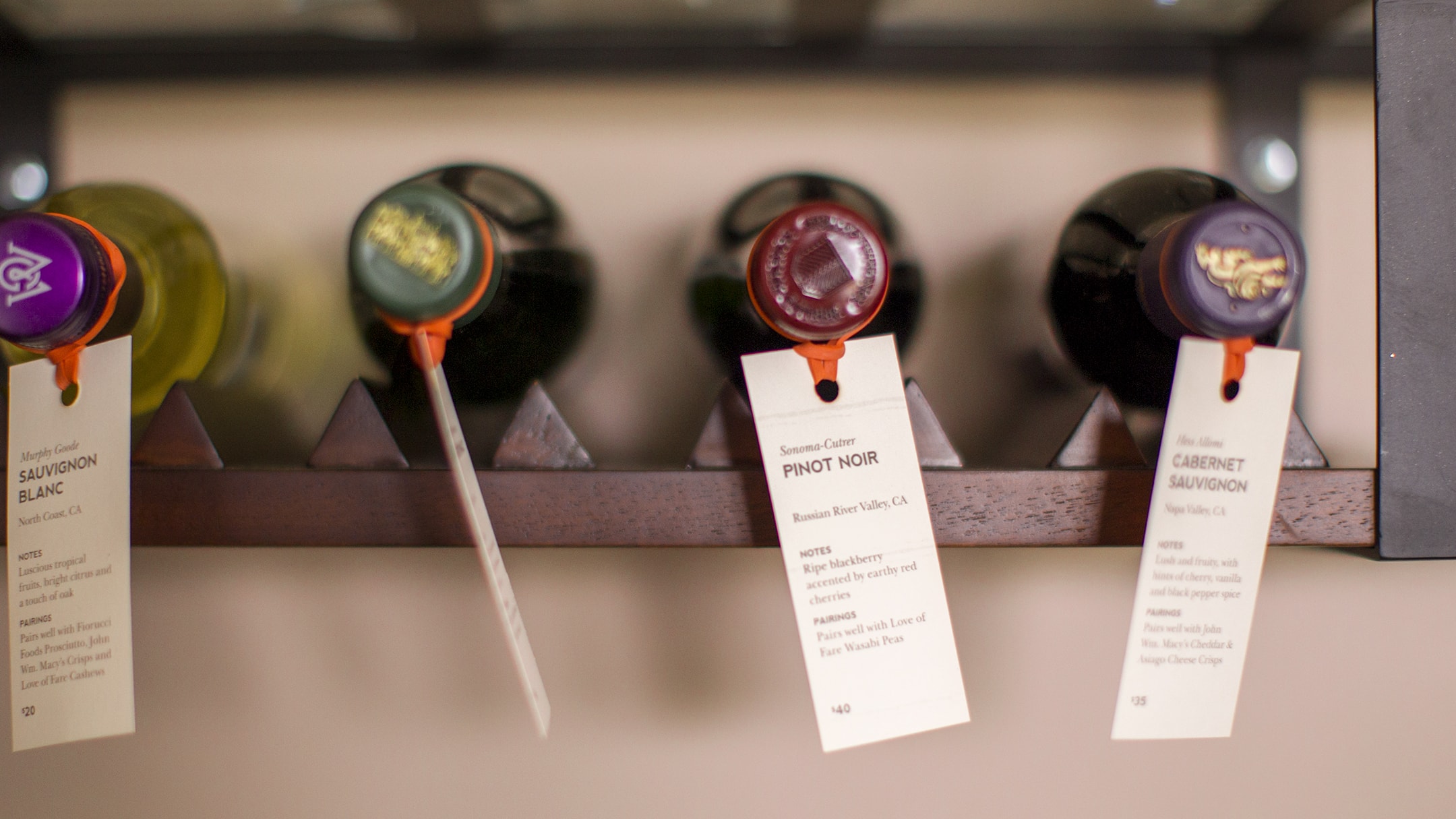 Epicurean Hotel branded wine flights with info tags
