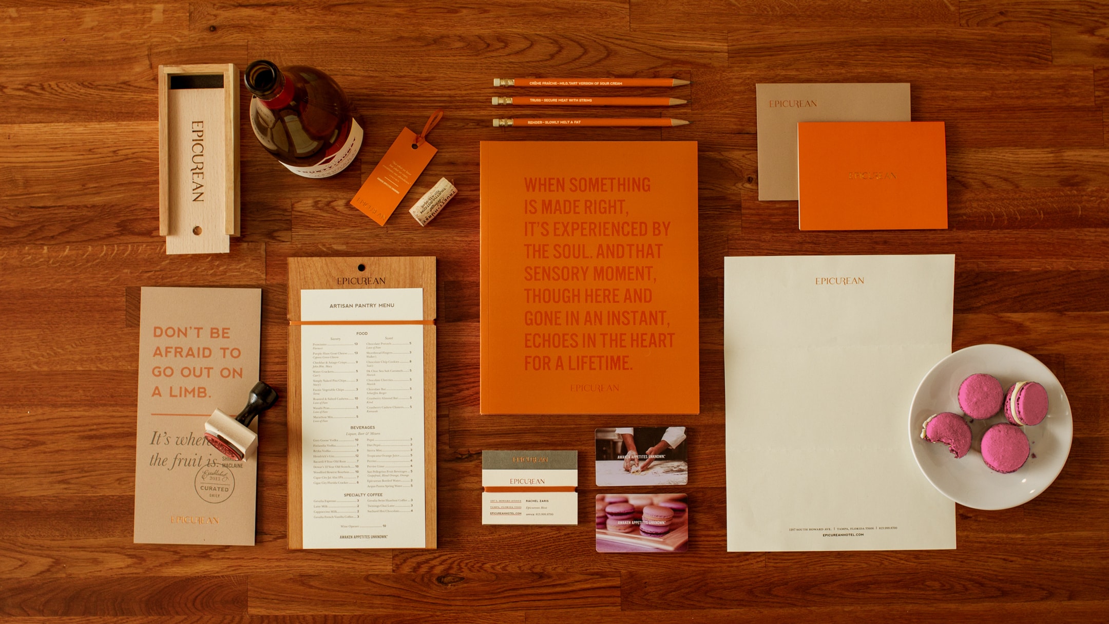 Epicurean Hotel branded collateral including menu and office supplies