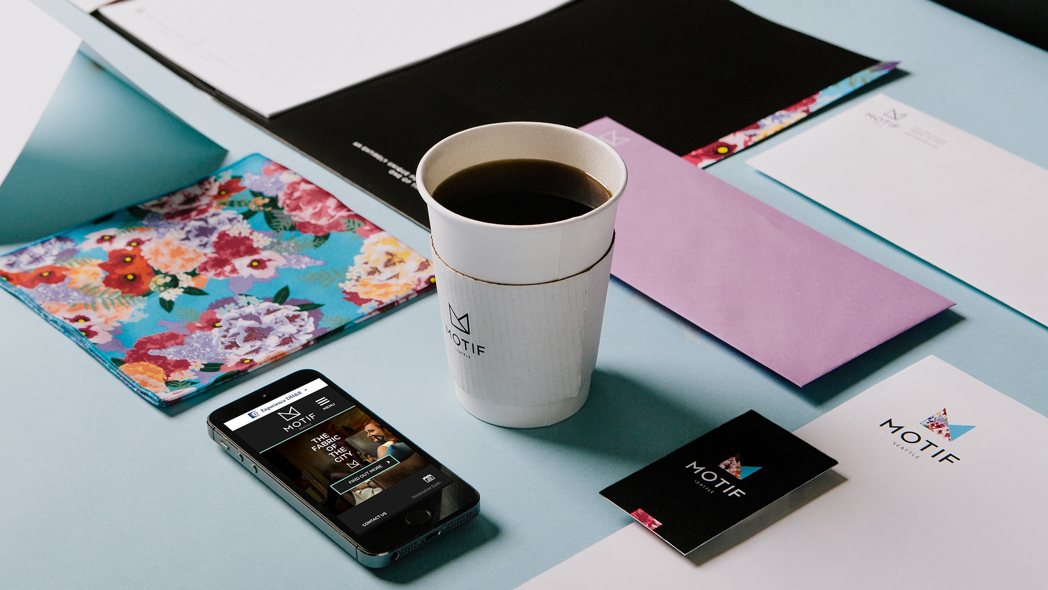 Motif Seattle collateral, iPhone app, and branded coffee cup